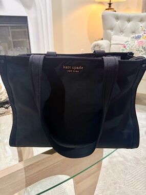 kate spade black reversible tote with gold-tone logo